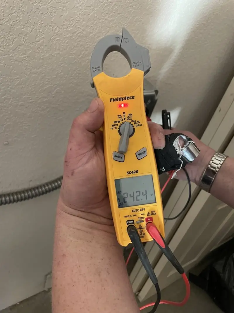 Voltage testing with clamp meter during Outlet Installation in Scranton
